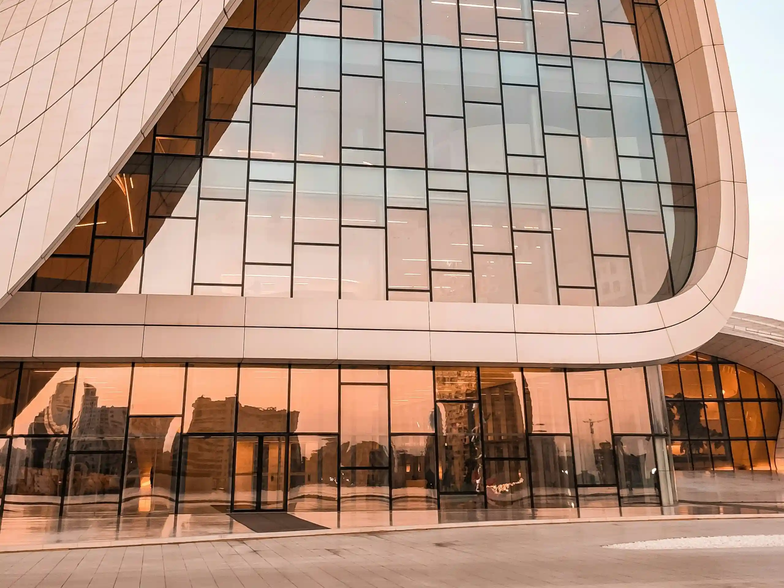 Minimalist architectural glass facade designed for energy efficiency and modern aesthetics